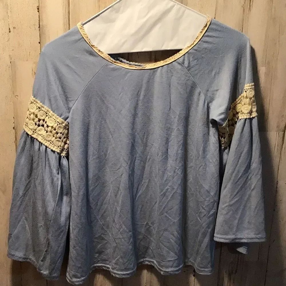 Blouse Loose embroidery on sleeve by poof girl ￼ Size youth large